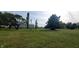 Large grassy yard with a barn in the background at 9265 N Evans Rd, Monrovia, IN 46157