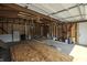 Unfinished garage interior with building materials and tools at 3730 Prospect St, Indianapolis, IN 46203