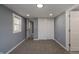 Bedroom with gray walls, carpet, and a large closet at 3730 Prospect St, Indianapolis, IN 46203