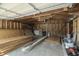 Unfinished garage interior with building materials and tools at 3730 Prospect St, Indianapolis, IN 46203