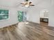 Main bedroom with ceiling fan and access to a balcony at 3213 Oceanline E Dr, Indianapolis, IN 46214