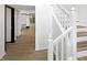 White staircase leading to the upper level at 3213 Oceanline E Dr, Indianapolis, IN 46214