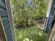 Private balcony with artificial turf and a view of trees at 3213 Oceanline E Dr, Indianapolis, IN 46214