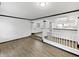 Spacious living room with hardwood floors and access to the kitchen at 3213 Oceanline E Dr, Indianapolis, IN 46214