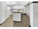 Bright kitchen features granite countertops and white cabinetry at 3213 Oceanline E Dr, Indianapolis, IN 46214