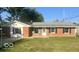 Brick ranch house with a well-kept lawn at 6733 S Cross St, Pendleton, IN 46064