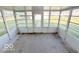 Screened sunroom with backyard access at 6733 S Cross St, Pendleton, IN 46064
