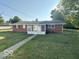 Brick ranch house with screen porch and a large backyard at 6733 S Cross St, Pendleton, IN 46064
