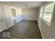 Spacious bedroom with vinyl flooring and neutral walls at 6733 S Cross St, Pendleton, IN 46064