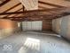 Spacious garage with overhead door and shelving at 6733 S Cross St, Pendleton, IN 46064