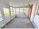 Bright sunroom, with brick wall and backyard view at 6733 S Cross St, Pendleton, IN 46064