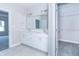 Bright, spacious bathroom featuring a double vanity, walk-in shower, and a large closet at 6210 Fairview Dr, McCordsville, IN 46055