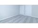 Spacious bedroom with gray carpeting, white walls, and two white doors at 6210 Fairview Dr, McCordsville, IN 46055