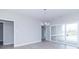 Dining room with sliding glass door, chandelier, and wood-style flooring at 6210 Fairview Dr, McCordsville, IN 46055