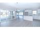 Dining area adjacent to the kitchen, with sliding glass doors leading to a patio at 6210 Fairview Dr, McCordsville, IN 46055