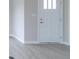 Simple entryway with a white door and light gray flooring at 6210 Fairview Dr, McCordsville, IN 46055