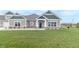 Charming two-story home with a green and white exterior and a lush green lawn at 6210 Fairview Dr, McCordsville, IN 46055