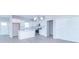 Bright kitchen featuring white cabinets, stainless steel appliances, and an island at 6210 Fairview Dr, McCordsville, IN 46055