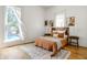 Bedroom with pool view and orange bedding at 1715 Alabama St, Indianapolis, IN 46202