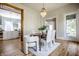 Bright dining room with hardwood floors and chandelier at 1715 Alabama St, Indianapolis, IN 46202