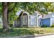 Gray and brown Victorian home with a charming front porch at 1715 Alabama St, Indianapolis, IN 46202