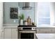 Modern kitchen with stainless steel appliances and marble counters at 1715 Alabama St, Indianapolis, IN 46202