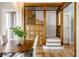 Unique dining room showcasing a built-in staircase at 1715 Alabama St, Indianapolis, IN 46202