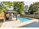 Relaxing backyard pool with a slide and gazebo at 1715 Alabama St, Indianapolis, IN 46202