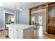 Updated kitchen with marble island and breakfast bar at 1715 Alabama St, Indianapolis, IN 46202