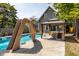 Large inground pool with a slide and basketball hoop at 1715 Alabama St, Indianapolis, IN 46202