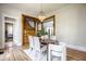 Spacious dining room with hardwood floors and chandelier at 1715 Alabama St, Indianapolis, IN 46202