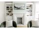 Living room with fireplace, built-ins, and hardwood floors at 1715 Alabama St, Indianapolis, IN 46202