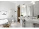 Elegant bathroom with double vanity and shower at 1715 Alabama St, Indianapolis, IN 46202