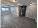 Finished basement with gray flooring and laundry area at 4050 Byram Ave, Indianapolis, IN 46208