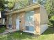 Brick ranch home with a white door and small front yard at 4050 Byram Ave, Indianapolis, IN 46208