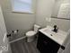 Updated bathroom with modern vanity and fixtures at 4050 Byram Ave, Indianapolis, IN 46208