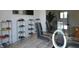 Glass-top dining table with chairs and display cases at 7419 Sylvan Ridge Rd, Indianapolis, IN 46240