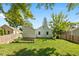 Large backyard with grassy lawn and wooden fence at 5648 N Keystone Ave, Indianapolis, IN 46220