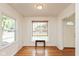 Simple dining room with hardwood floors and a view of the street at 5648 N Keystone Ave, Indianapolis, IN 46220