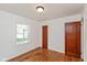 Spacious bedroom with hardwood floors and neutral walls at 5648 N Keystone Ave, Indianapolis, IN 46220