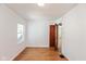 Bright bedroom with hardwood floors and neutral walls at 5648 N Keystone Ave, Indianapolis, IN 46220