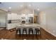 Modern kitchen with white cabinets and granite island at 1569 Tupelo Dr, Greenfield, IN 46140