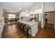 Modern kitchen with white cabinets, granite countertops, and stainless steel appliances at 1569 Tupelo Dr, Greenfield, IN 46140