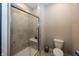 Clean bathroom with a shower and toilet at 1569 Tupelo Dr, Greenfield, IN 46140