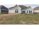 House exterior showcasing a back patio at 1569 Tupelo Dr, Greenfield, IN 46140