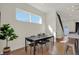 Bright dining area with a modern table and chairs, near kitchen at 417 E Morris St, Indianapolis, IN 46225