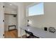 Small home office with desk, chair, and built-in closet at 417 E Morris St, Indianapolis, IN 46225