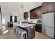 Modern kitchen with island, stainless steel appliances, and hardwood floors at 417 E Morris St, Indianapolis, IN 46225