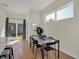 Light-filled dining area with sliding glass doors leading to backyard at 417 E Morris St, Indianapolis, IN 46225