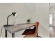 Small home office with gray desk, brown chair, and good natural light at 417 E Morris St, Indianapolis, IN 46225
